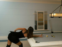 mika is playing billiards